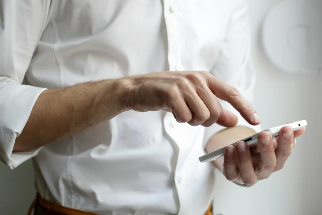 Checking a project update on a smartphone