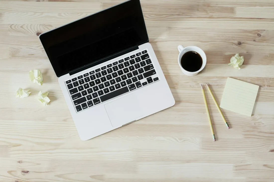 Focused laptop workspace for tracking tasks