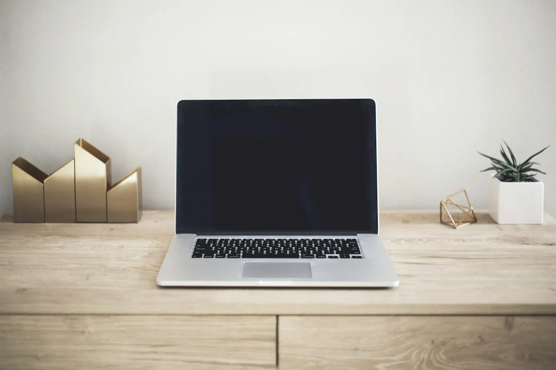 Laptop in a clean business workspace
