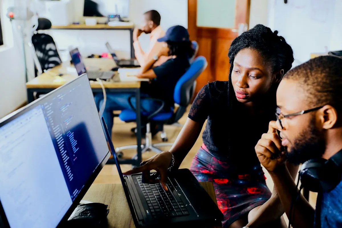 Colleagues configuring digital tools